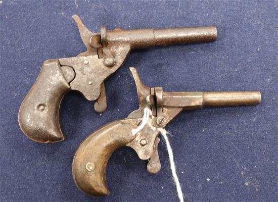 Two muff pistols, circa 1890